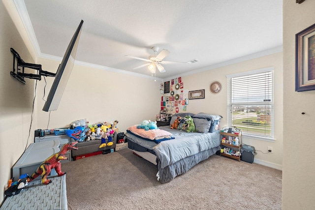 bedroom with ceiling fan, carpet floors, visible vents, and crown molding