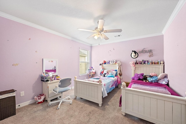 carpeted bedroom with ornamental molding, visible vents, ceiling fan, and baseboards