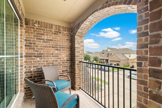 balcony featuring a residential view