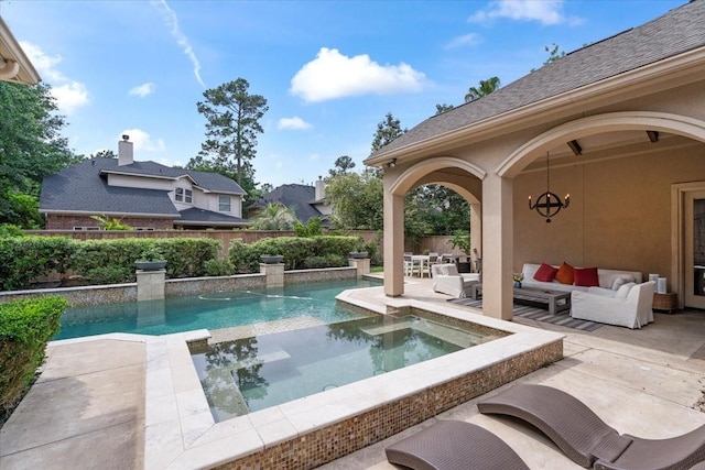 view of pool featuring an outdoor living space, a fenced in pool, a patio, and a fenced backyard