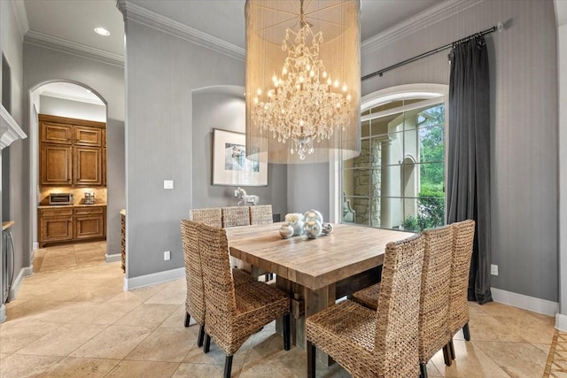 dining area with recessed lighting, baseboards, and ornamental molding