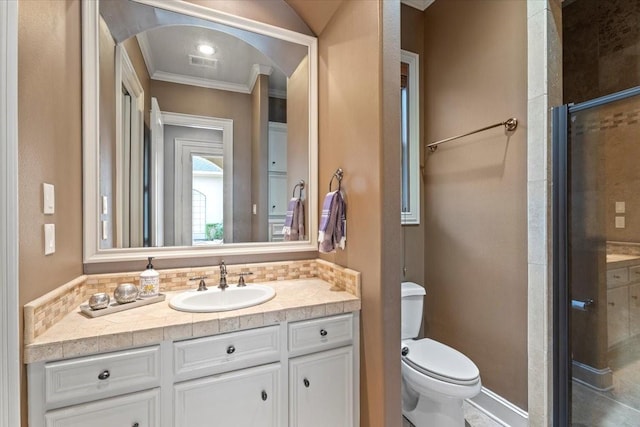 bathroom featuring an enclosed shower, visible vents, toilet, backsplash, and vanity