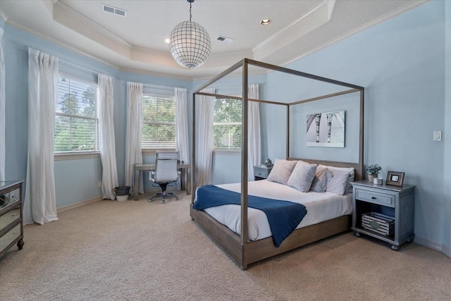 bedroom featuring visible vents, a tray ceiling, crown molding, baseboards, and light colored carpet