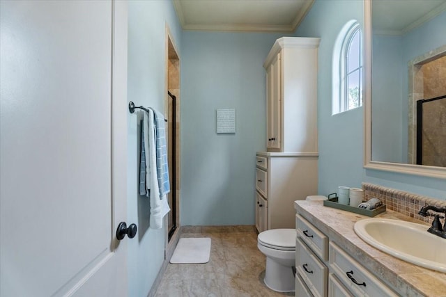 full bath with vanity, crown molding, toilet, and a stall shower