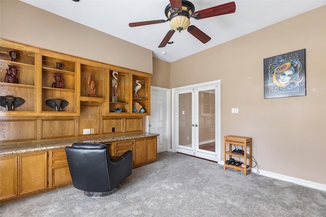 home office with french doors, light carpet, baseboards, and ceiling fan