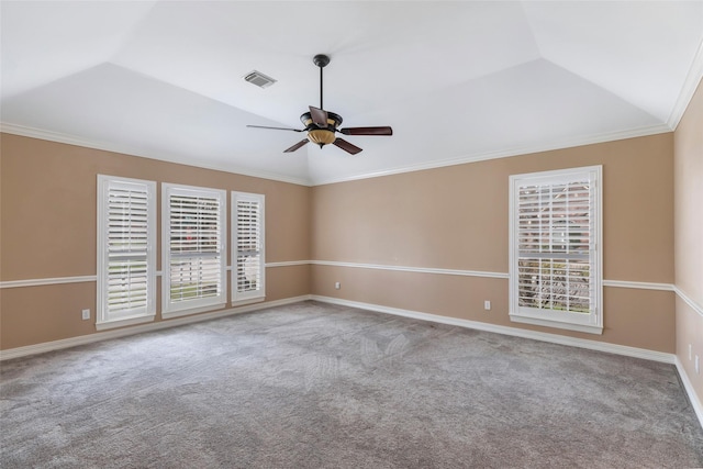 spare room with a ceiling fan, lofted ceiling, a healthy amount of sunlight, and ornamental molding