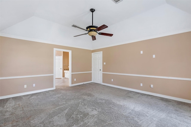 unfurnished room featuring ornamental molding, a ceiling fan, carpet floors, baseboards, and vaulted ceiling