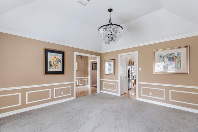 unfurnished room with visible vents, a decorative wall, light colored carpet, lofted ceiling, and a notable chandelier