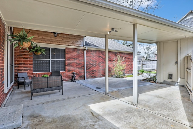 view of patio with fence