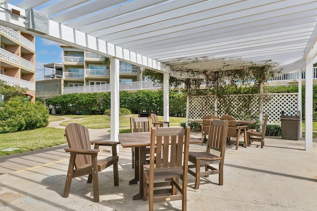 view of patio / terrace featuring outdoor dining area and a pergola