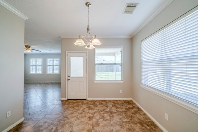 unfurnished dining area with ornamental molding, visible vents, plenty of natural light, and baseboards