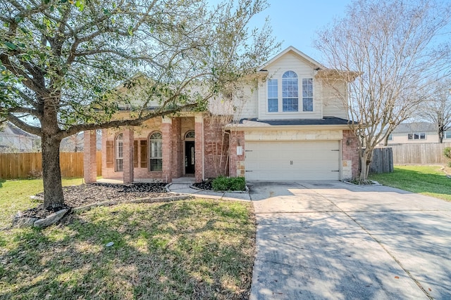 view of front of house with a garage, concrete driveway, brick siding, and fence