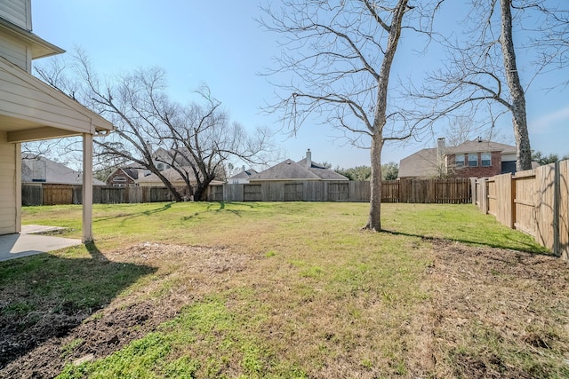 view of yard featuring a fenced backyard and a patio