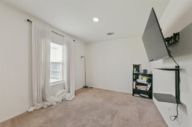 interior space featuring baseboards and visible vents