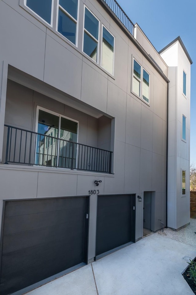 view of building exterior with an attached garage