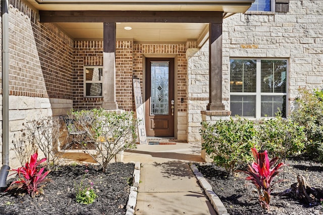 entrance to property with brick siding