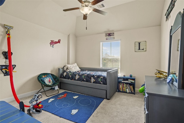 carpeted bedroom with vaulted ceiling, ceiling fan, visible vents, and baseboards