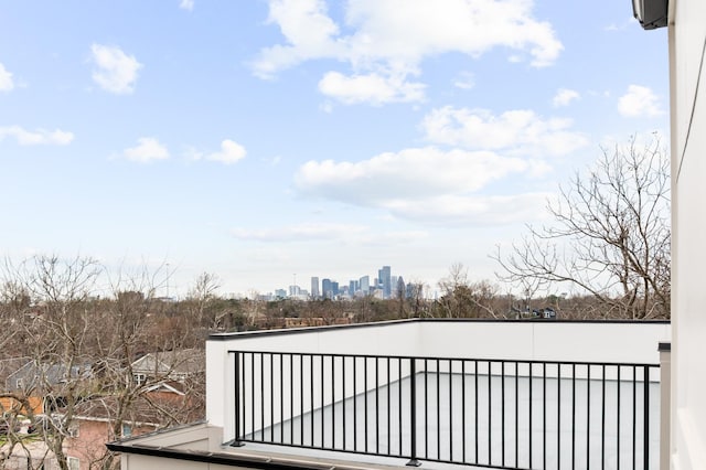 wooden terrace with a city view