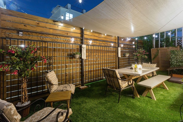 view of patio at twilight