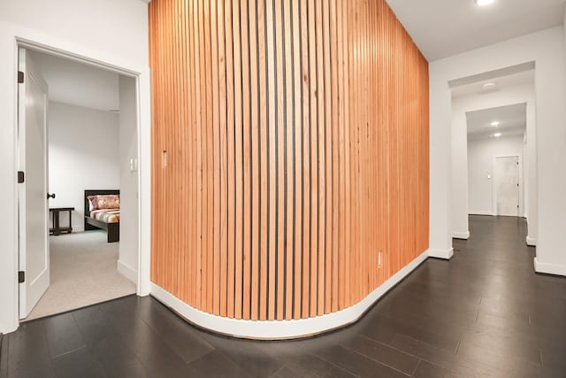 hall with recessed lighting, baseboards, and wood finished floors