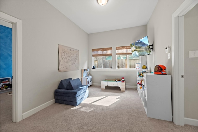 bedroom featuring baseboards and carpet flooring