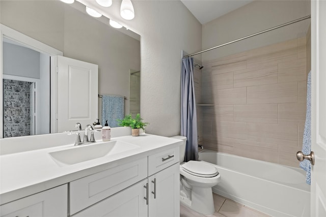 full bathroom featuring shower / bath combination with curtain, tile patterned flooring, vanity, and toilet