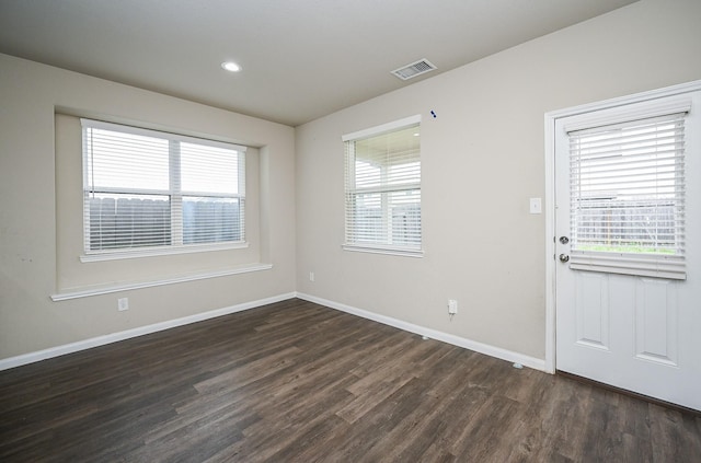 3734 Giorgio Pastel Pl, Katy, TX 77493 - interior space with recessed lighting, visible vents, baseboards, and dark wood-style floors