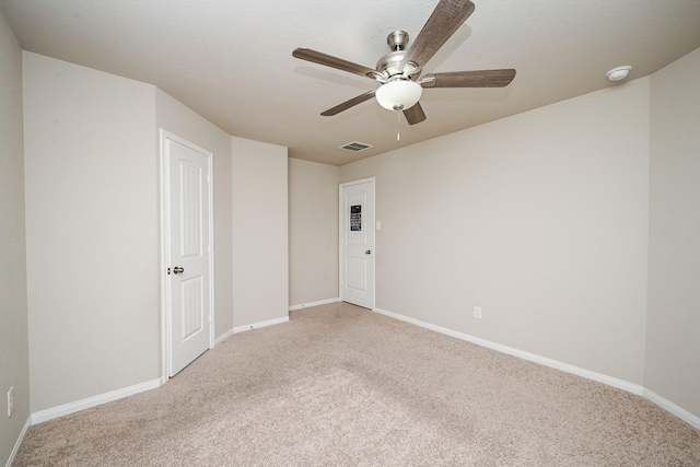 3734 Giorgio Pastel Pl, Katy, TX 77493 - empty room featuring visible vents, baseboards, ceiling fan, and carpet floors