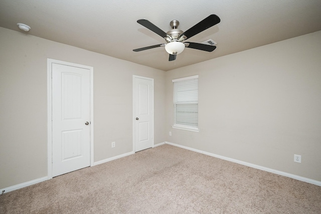 3734 Giorgio Pastel Pl, Katy, TX 77493 - unfurnished bedroom with baseboards, visible vents, carpet floors, and ceiling fan