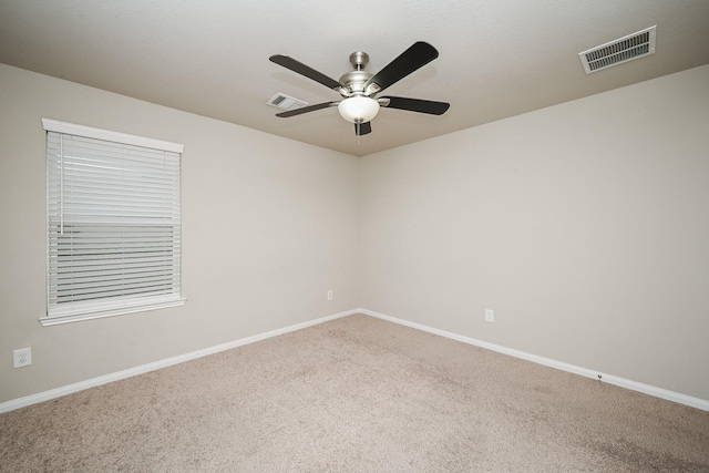 3734 Giorgio Pastel Pl, Katy, TX 77493 - empty room with visible vents, carpet floors, baseboards, and a ceiling fan