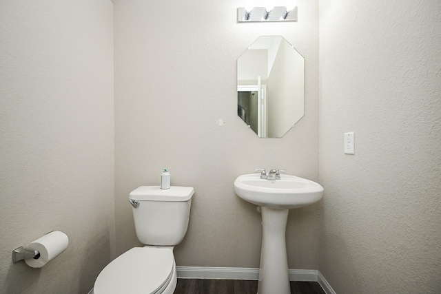 3734 Giorgio Pastel Pl, Katy, TX 77493 - bathroom with toilet, wood finished floors, and baseboards