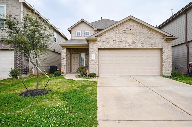 3734 Giorgio Pastel Pl, Katy, TX 77493 - view of front of home with cooling unit, roof with shingles, concrete driveway, a front lawn, and brick siding