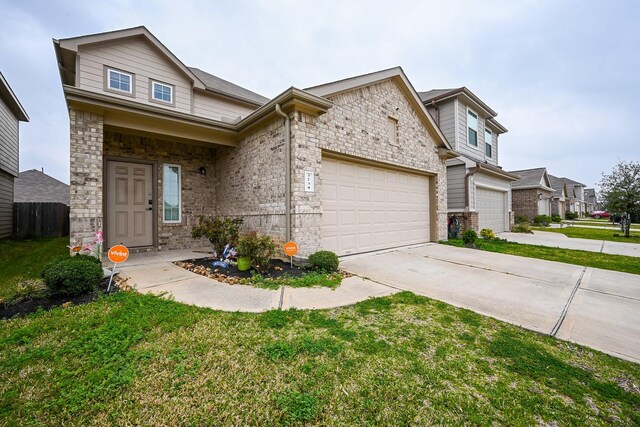 3734 Giorgio Pastel Pl, Katy, TX 77493 - view of front facade with driveway, an attached garage, and a front yard