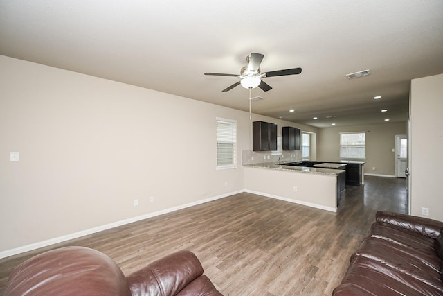 3734 Giorgio Pastel Pl, Katy, TX 77493 - living room featuring visible vents, dark wood-style floors, recessed lighting, baseboards, and ceiling fan