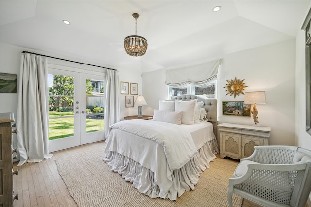 bedroom featuring recessed lighting, light wood-style floors, vaulted ceiling, access to exterior, and french doors