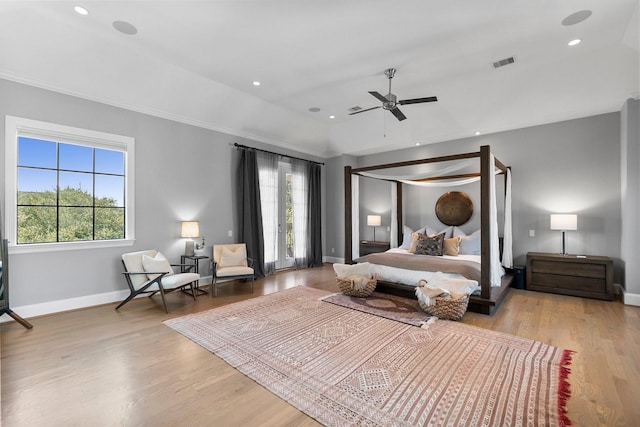 bedroom featuring recessed lighting, visible vents, baseboards, and wood finished floors