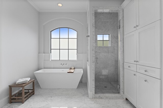 bathroom featuring a marble finish shower, a soaking tub, ornamental molding, marble finish floor, and recessed lighting