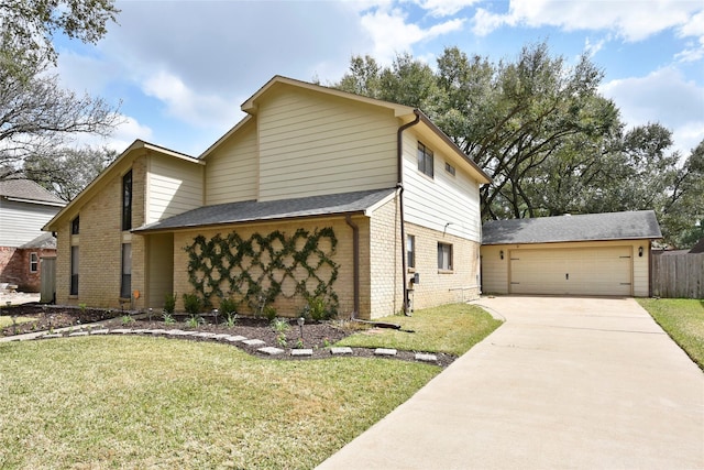 view of side of home with a garage, brick siding, and a yard