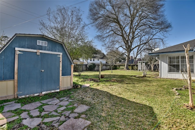 view of shed with fence