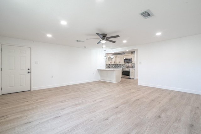 unfurnished living room featuring recessed lighting, visible vents, light wood-style flooring, a ceiling fan, and baseboards