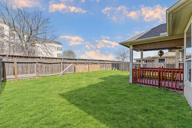 view of yard featuring a fenced backyard