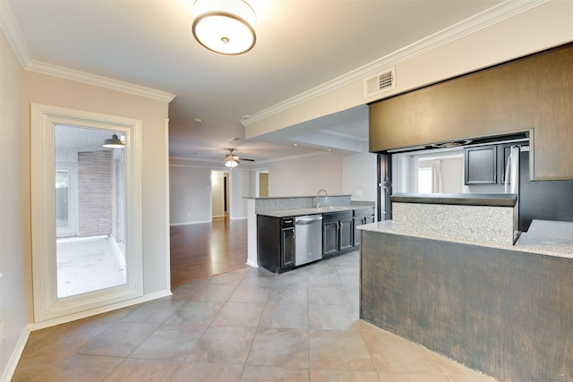 kitchen featuring light countertops, ornamental molding, light tile patterned flooring, a sink, and dishwasher