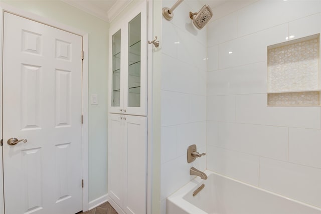 full bathroom with crown molding and bathing tub / shower combination