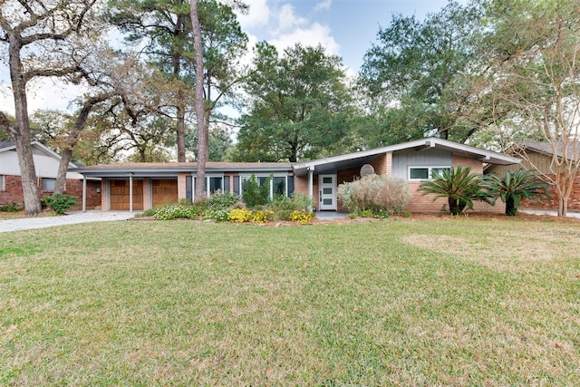 single story home with concrete driveway, brick siding, and a front lawn