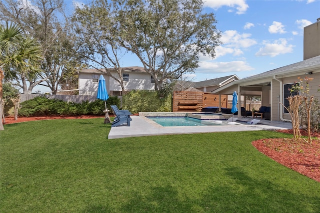 view of swimming pool with a patio area, a fenced backyard, an in ground hot tub, and a yard