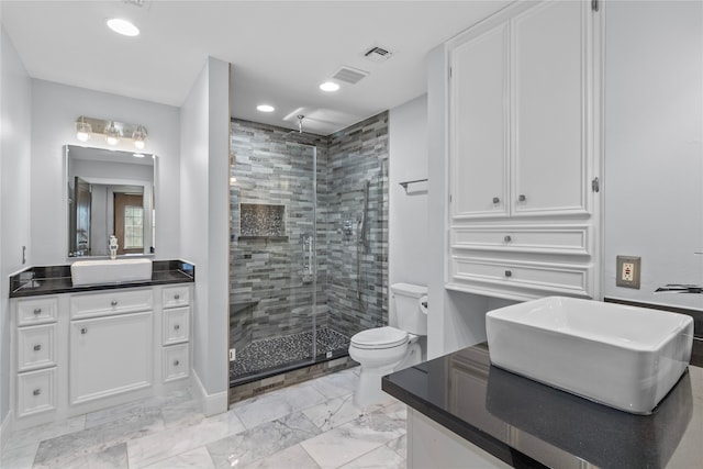 full bath featuring marble finish floor, visible vents, toilet, a stall shower, and vanity