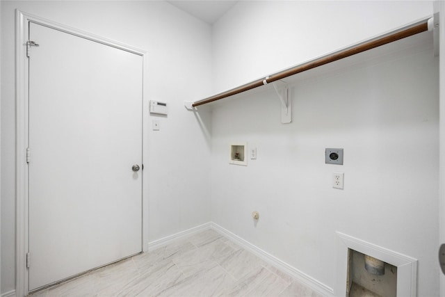 washroom with hookup for a washing machine, hookup for a gas dryer, laundry area, baseboards, and electric dryer hookup