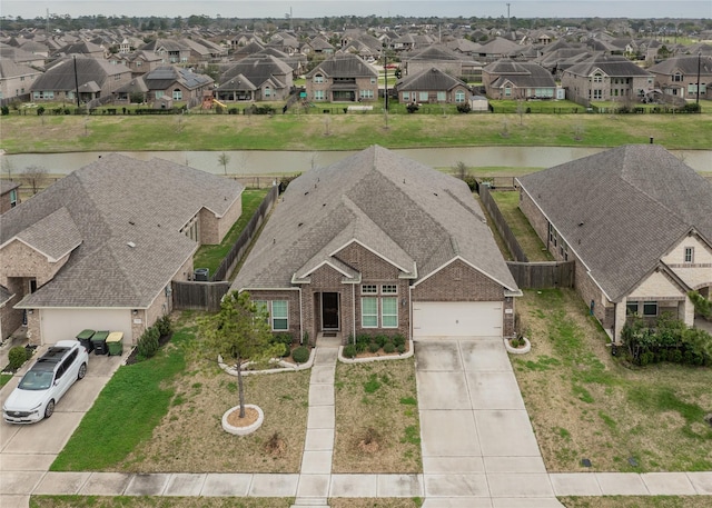 drone / aerial view with a residential view