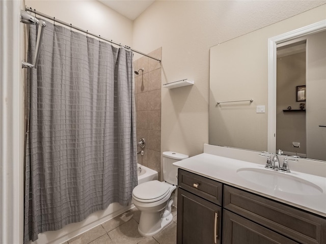 full bathroom with vanity, shower / bath combo with shower curtain, toilet, and tile patterned floors