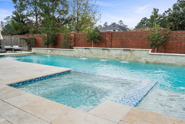 view of swimming pool with a fenced in pool, a patio area, and a fenced backyard